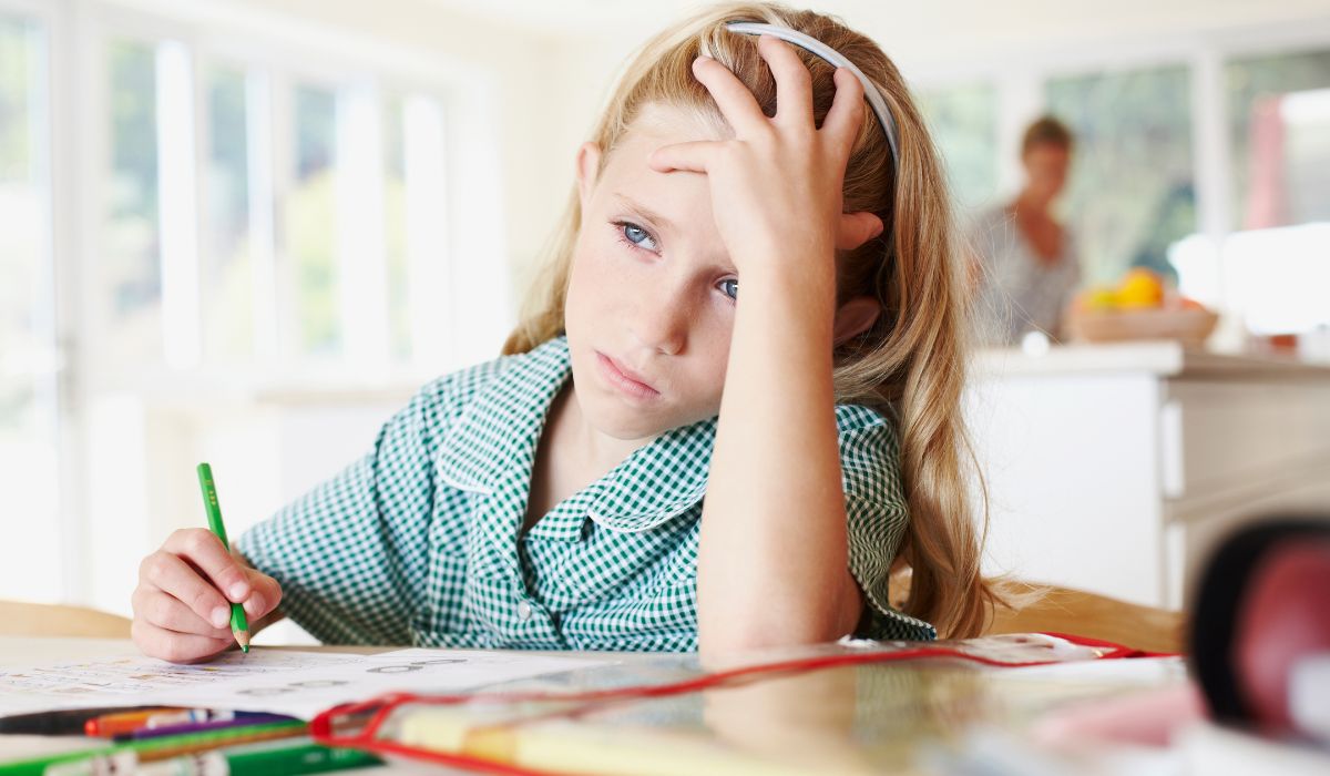 Sad child in school