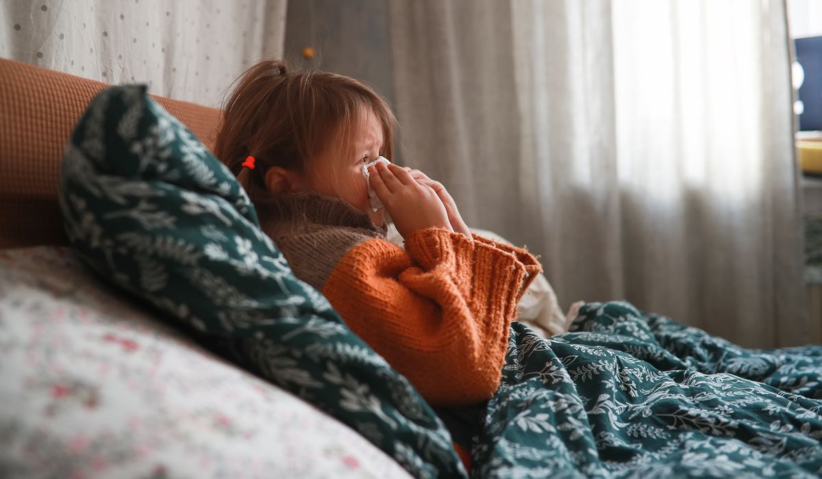 Child sick in bed