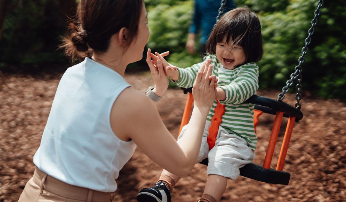 Mother and child in a playground