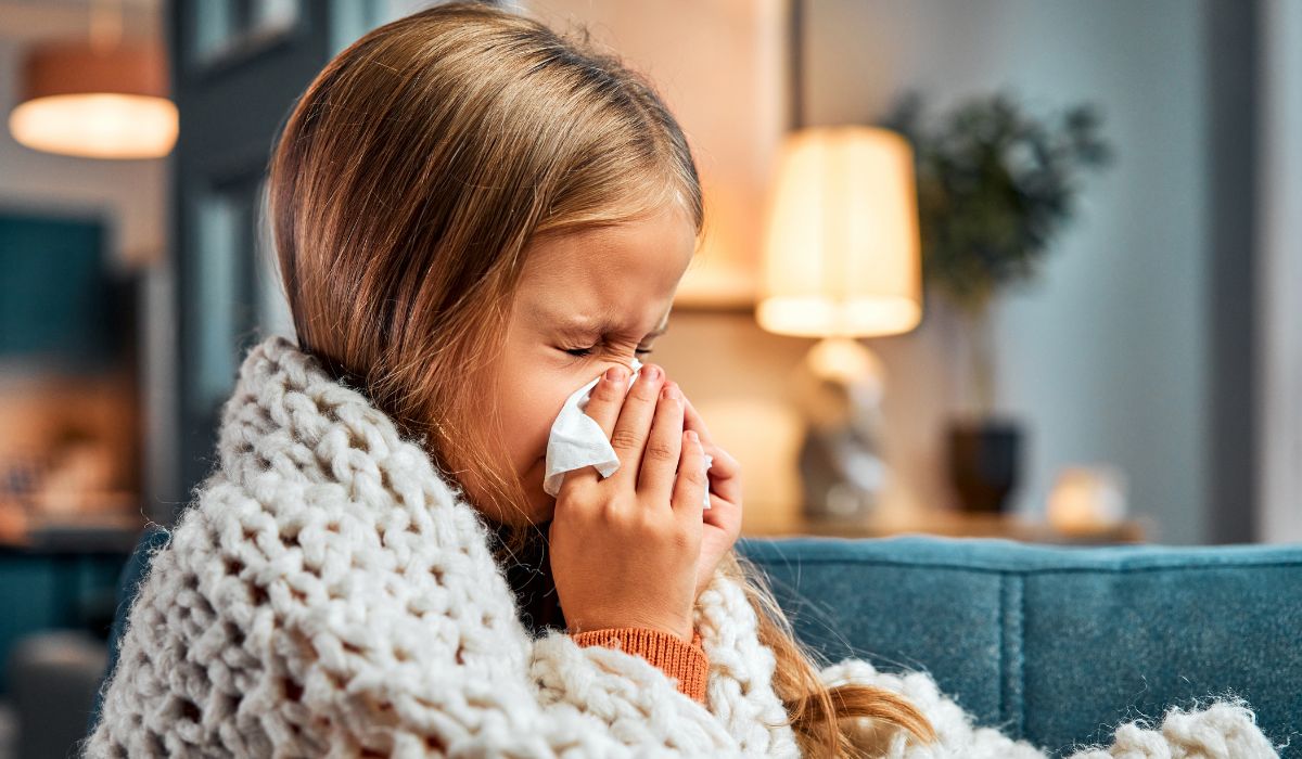 Young girl with a cold