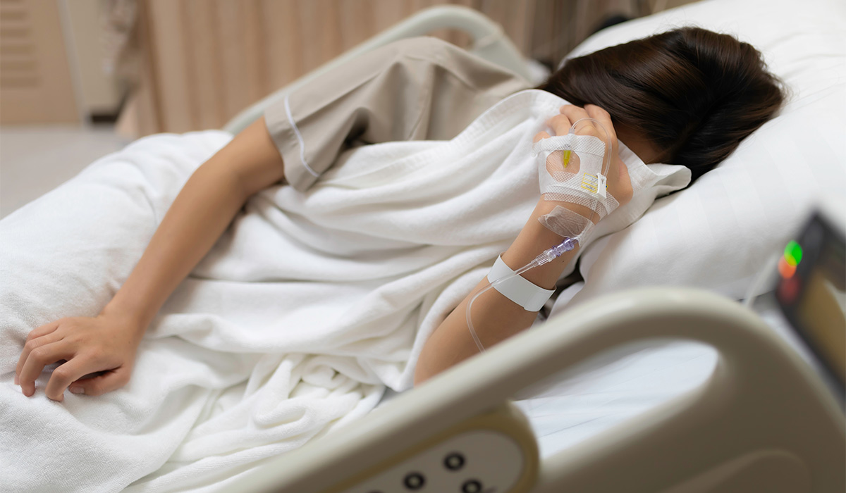 Asian woman is sick and is being treated at the hospital,Waiting for the doctor to give intravenous medication,A nurse came to take my temperature and measure my blood pressure.; Shutterstock ID 2492958369; purchase_order: -; job: -; client: -; other: -