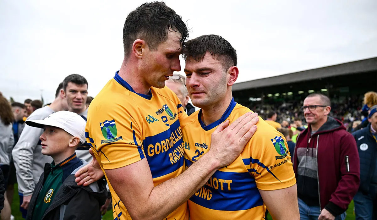 An emotional John Keane, right, is consoled by Summerhill teammate Adam Flanagan after their side's victory in the Meath County Senior Club Football Championship final match between Ratoath and Summerhill at Páirc Tailteann in Navan, Meath. Pic: Ben McShane/Sportsfile