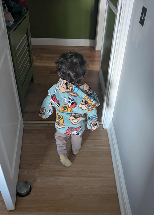 Two year old running around the kitchen