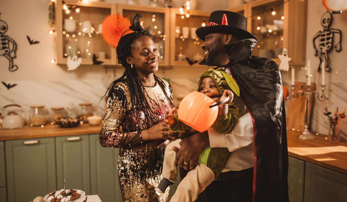 Parents with baby at Halloween