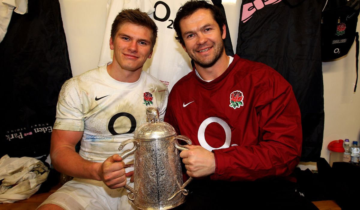 Owen Farrell and Andy Farrell pose with the Calcutta Cup.