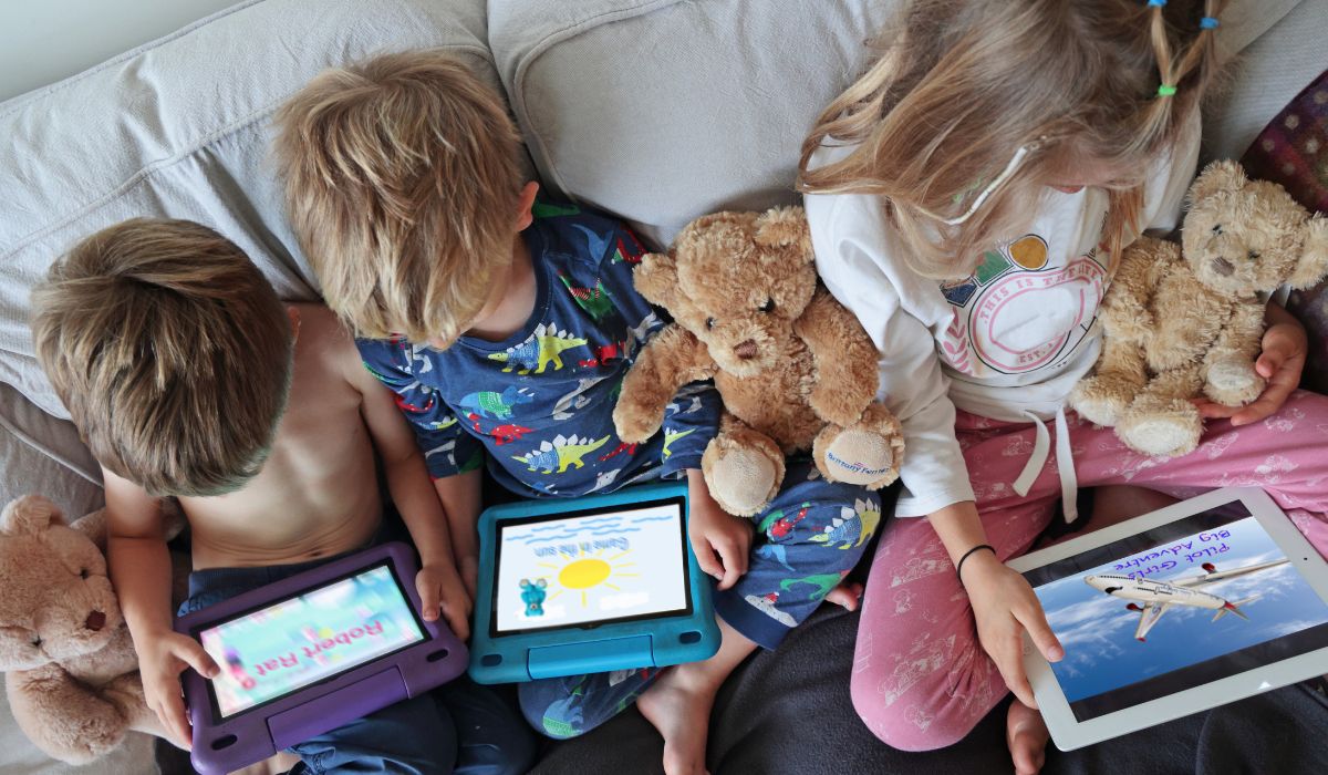 Children looking at screens