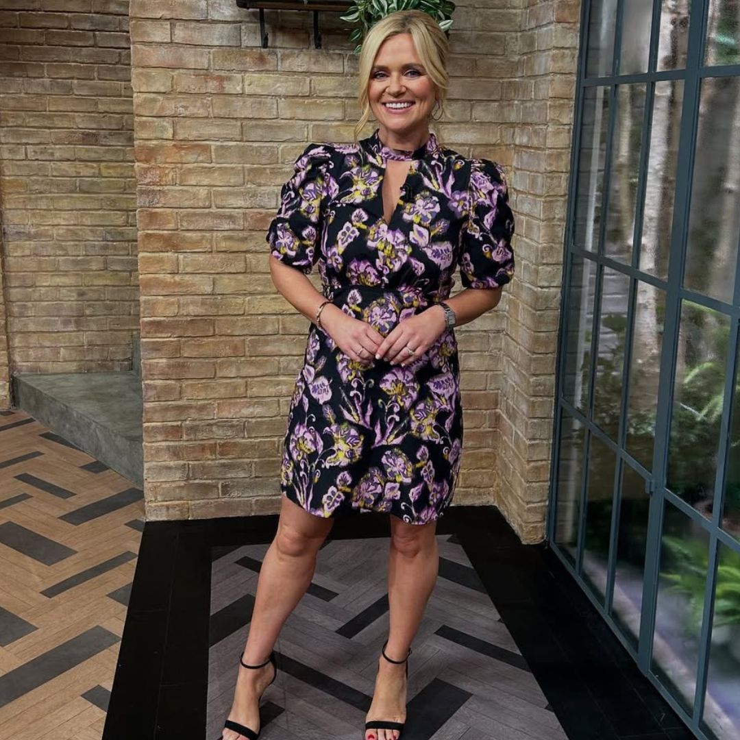 Karen Koster in a floral high neck dress