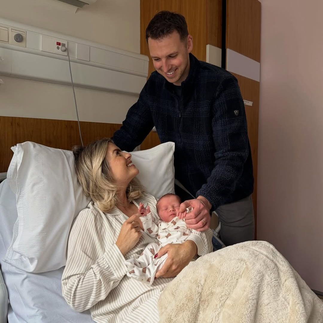 Lauren Arthurs, her husband and her second child
