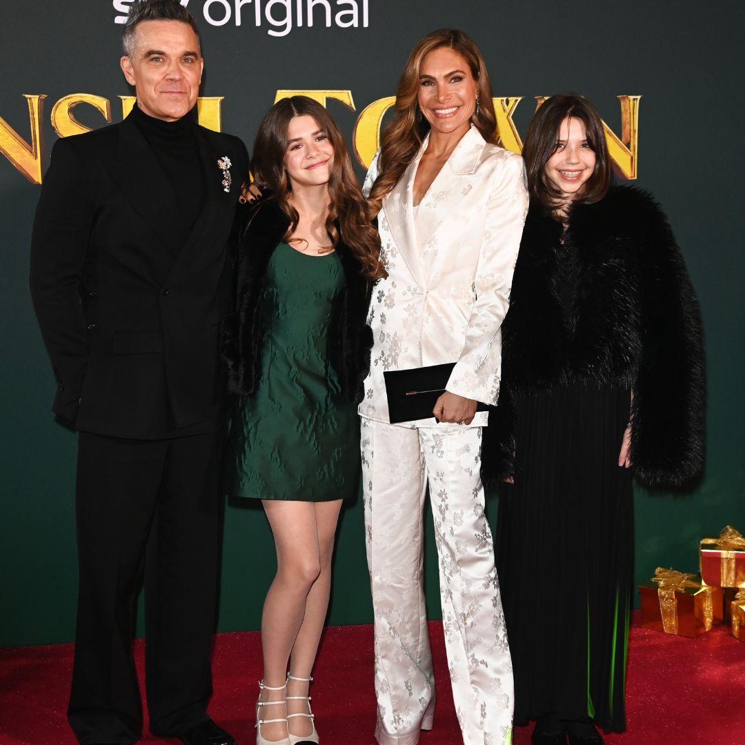 Robbie Williams, Teddy Williams and Ayda Field Williams attend the "Tinsel Town" World Premiere at Vue Leicester Square on November 27, 2025 in London, England