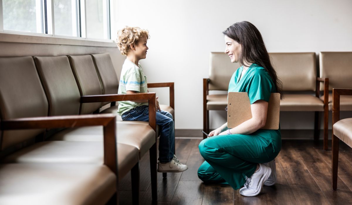 Doctor speaking to child