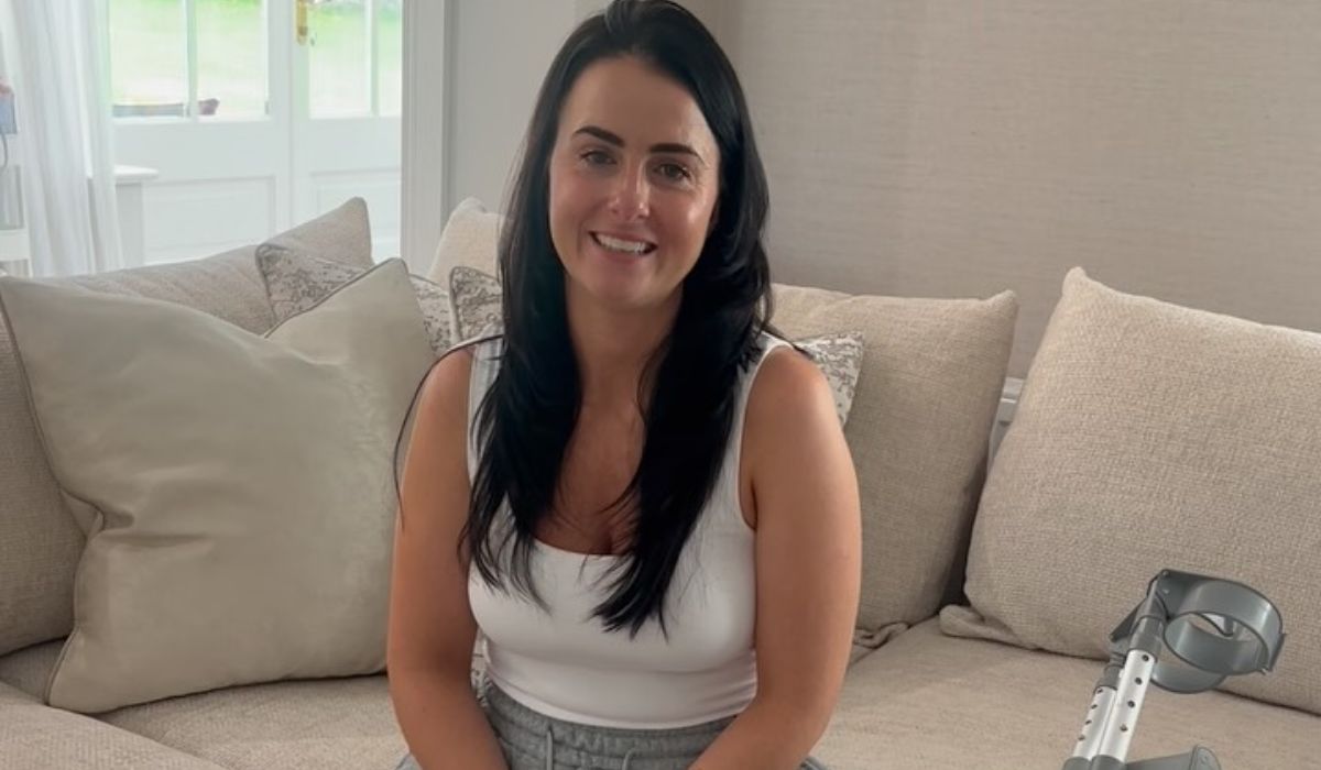 Lisa McHugh sitting on a couch