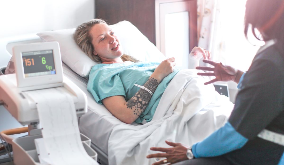 Woman with a doula in hospital