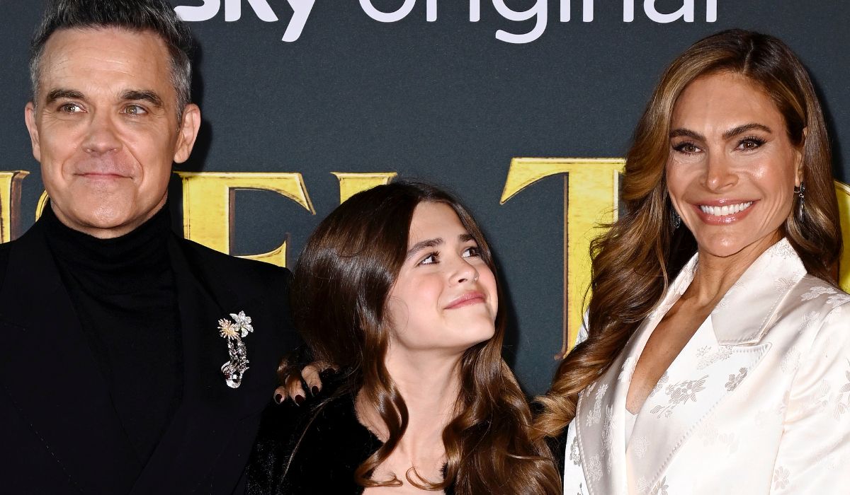 Robbie Williams, Teddy Williams and Ayda Field Williams attend the "Tinsel Town" World Premiere at Vue Leicester Square on November 27, 2025 in London, England