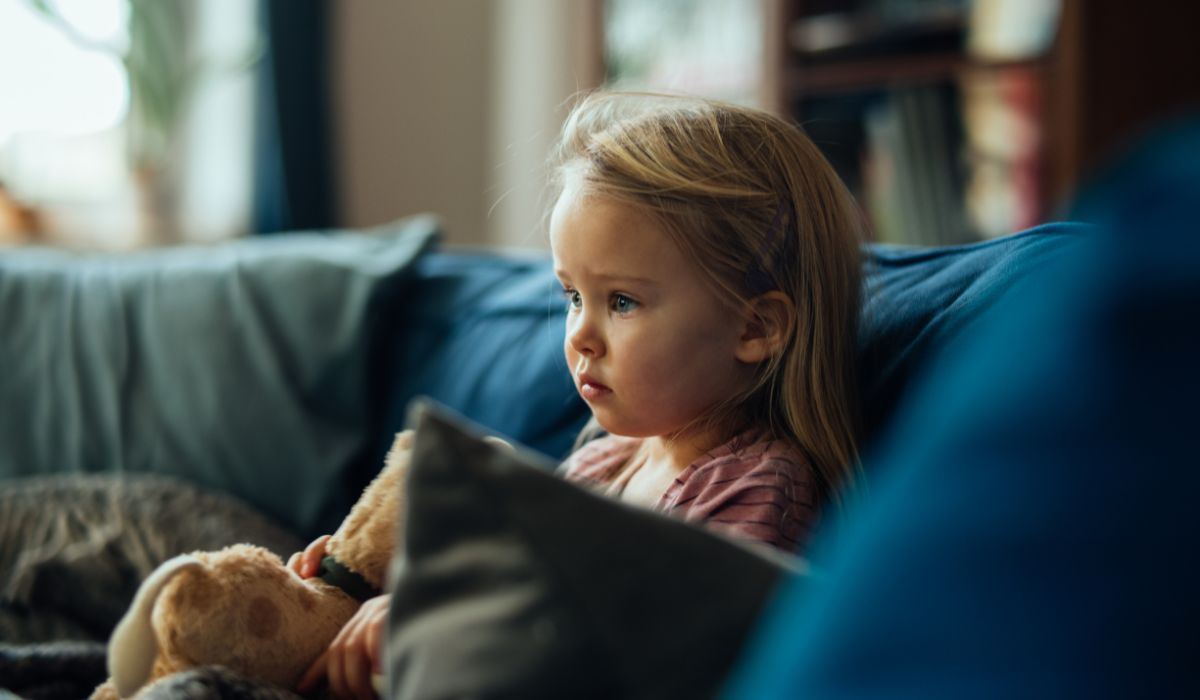 Young girl watching TV