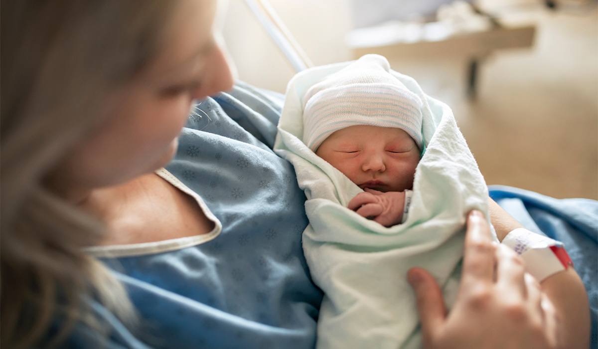 Mother with her newborn baby at the hospital a day after a natural birth labor; Shutterstock ID 1839847582; purchase_order: -; job: -; client: -; other: