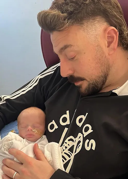 Johnny 'Smacks' McMahon with his newborn son, JJ. Pic: The 2 Johnnies/Instagram