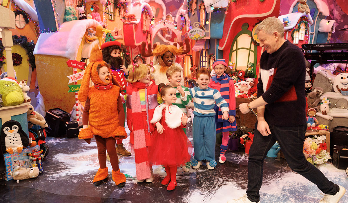 Host Patrick Kielty reveals the set at a photocall with cast members from the Spotlight Stage School, Anna May Rennicks DOG (9) from Navan, Douglas Reid BRICKLEBAUM (11) from Carlow, Poppy Madden CINDY LOU (9) from Carlow, Bonnie Fagan VILLAGER (4) from Navan, Joanna Ujadughele MOOSE (10) from Carlow, Louis Hanna BROTHER BEAN (7) from Dublin, Paddy Geraghty BROTHER BUSTER (9) from Navan, Sophie Brennan ICE SKATER (11) from Carlow. PIC: Andres Poveda