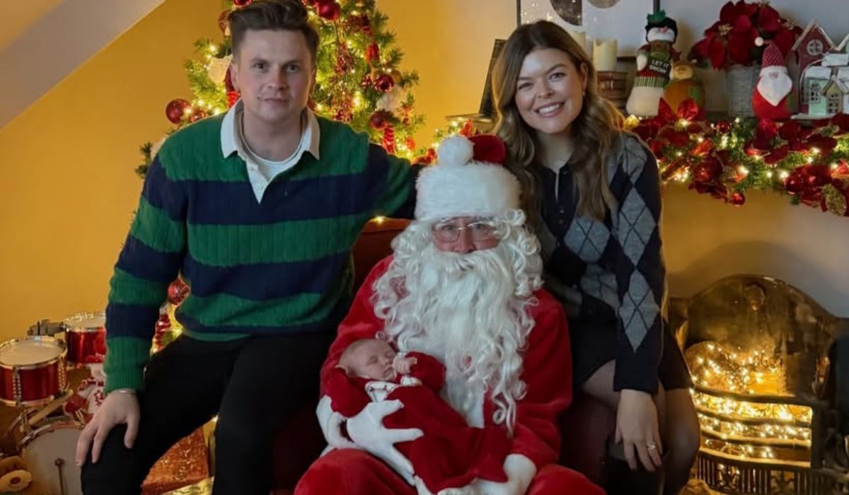 Doireann. Mark and baby Rosie visiting Santa
