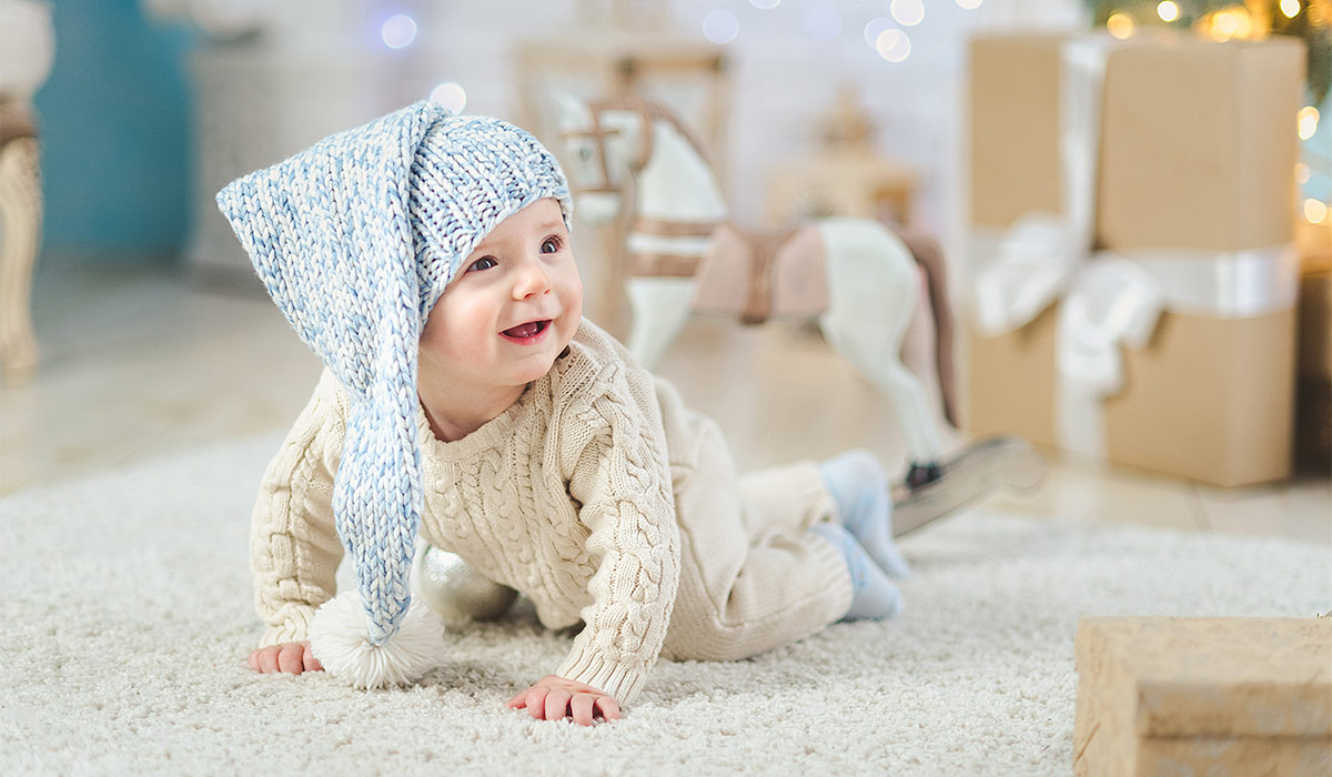 Beautiful boy near decorated Christmas tree. Happy new year. Portrait little child. happy new year 2020 concept. first baby Christmas; Shutterstock ID 1549472540; purchase_order: -; job: -; client: -; other: