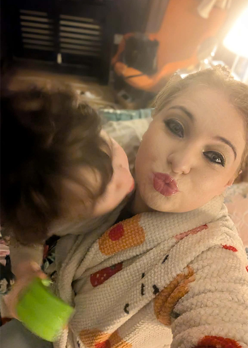 Alex giving me a kiss before my work Christmas party. Pic: Supplied