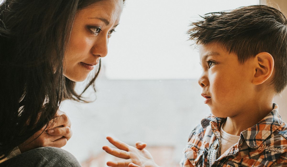 Mother talking to son