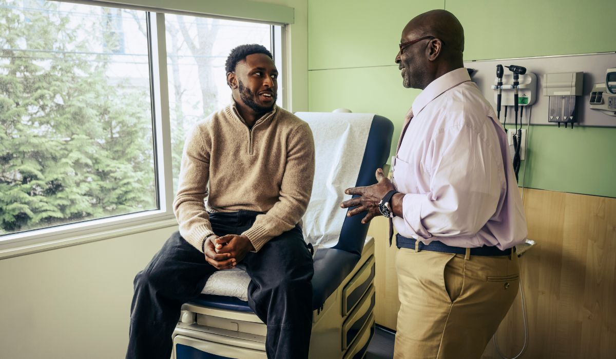 Man speaking to doctor