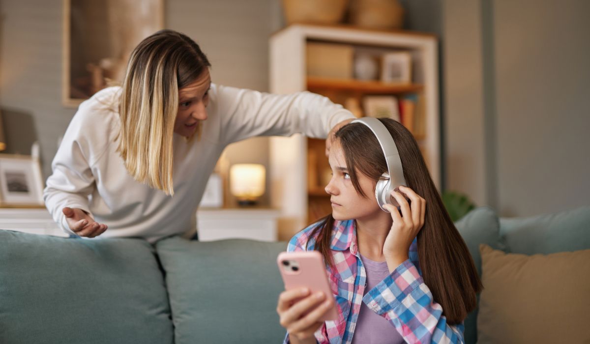 Teenage girl talking to mother