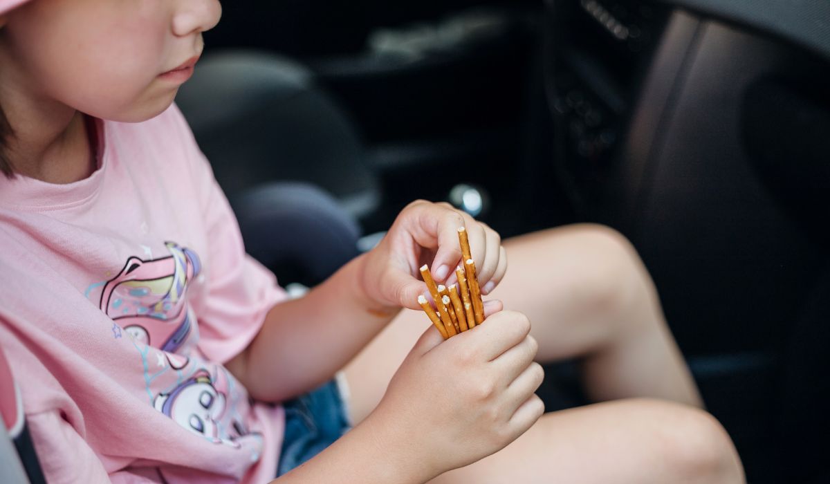 Girl eating pretzels