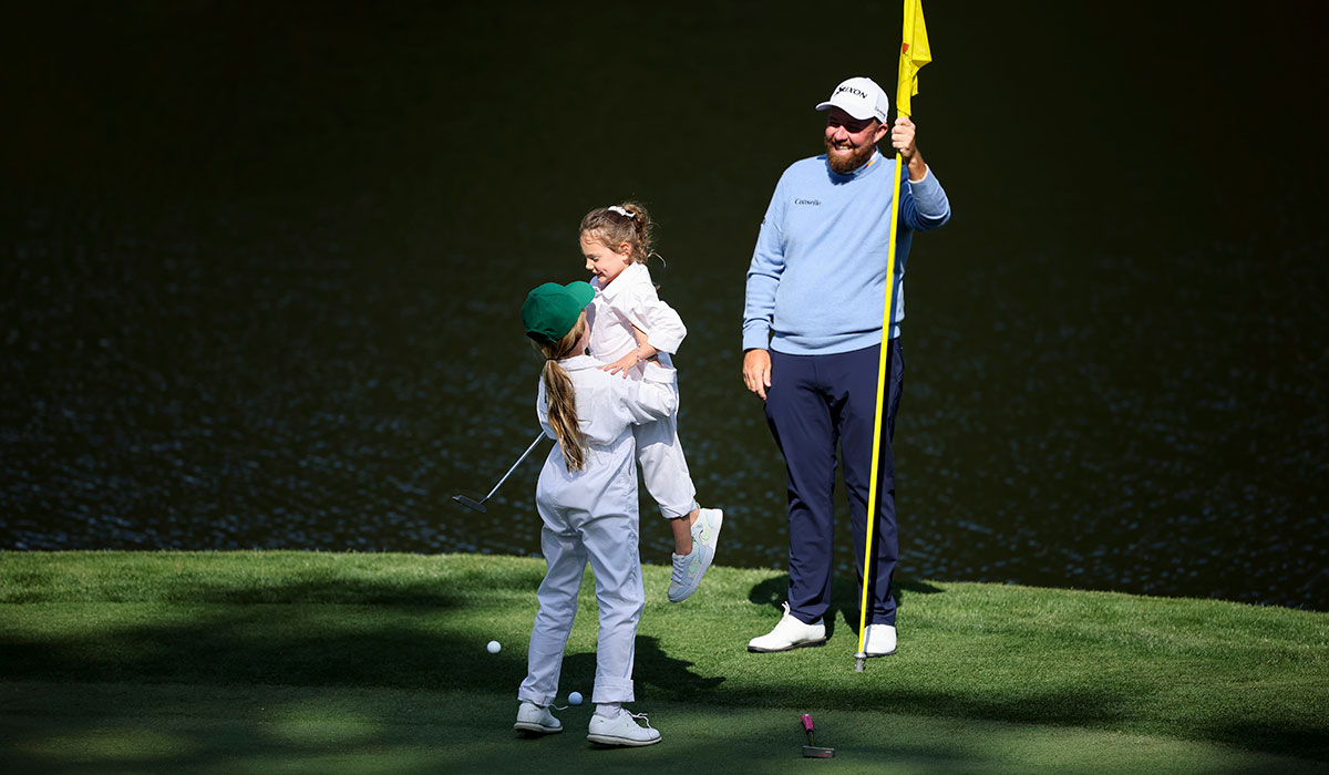 Shane and Iris Lowry with Poppy McIlroy. Pic: Hector Vivas/Getty Images