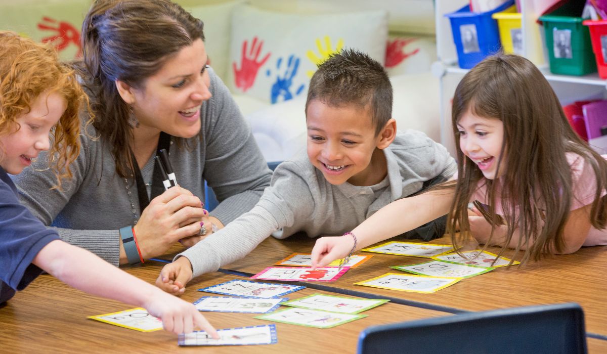 Teacher with young children