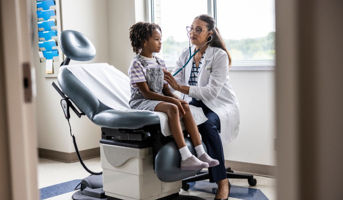 Boy being examined by doctor