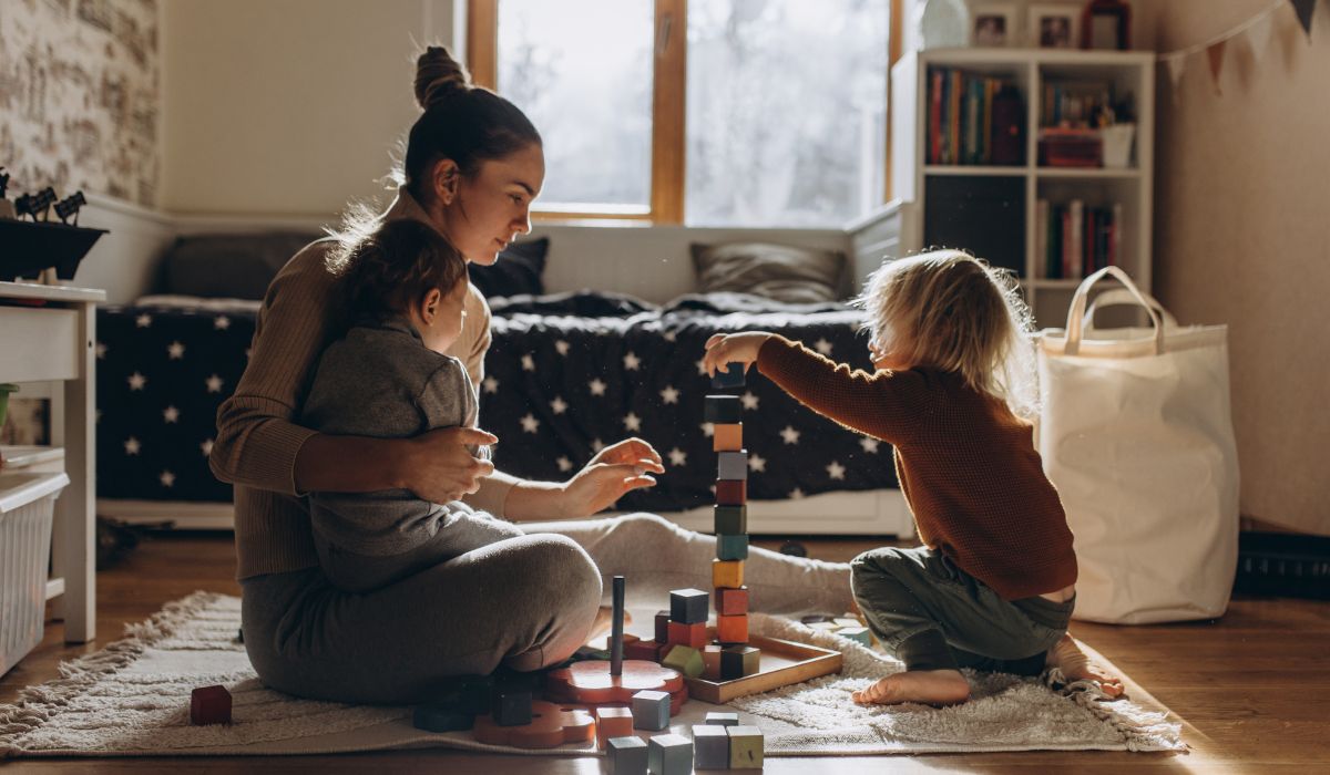Mother and toddler playing