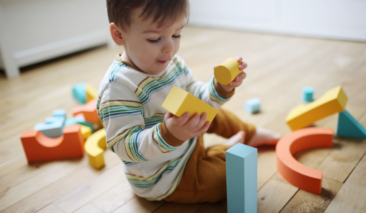 Toddler playing with blocks