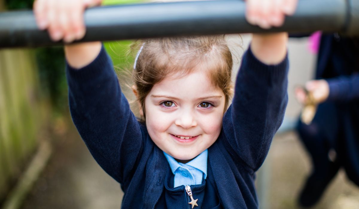 Girl wearing primary school uniform