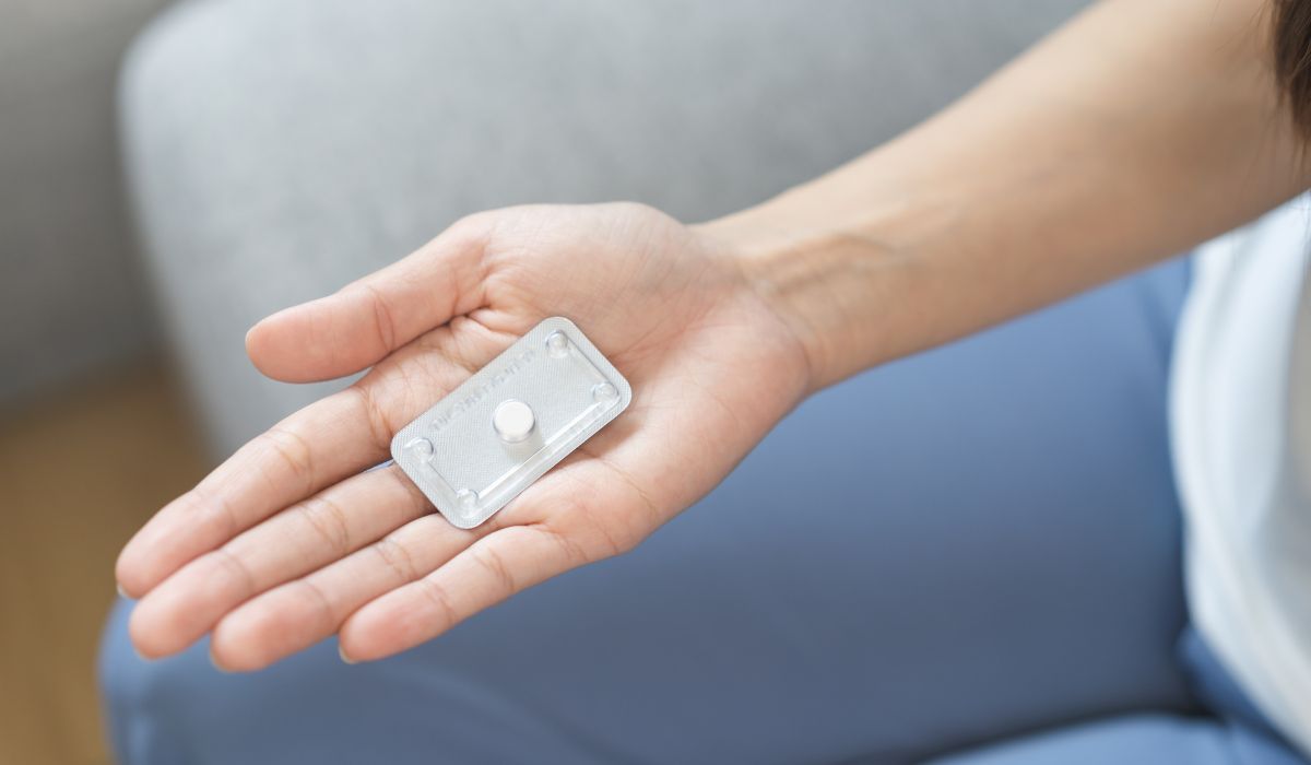 Woman taking morning-after pill