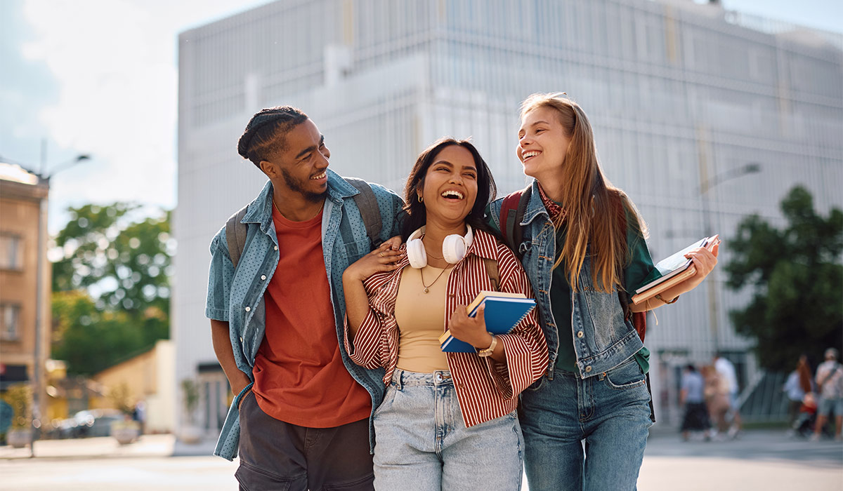 Group of happy university students goin on a lecture together. ; Shutterstock ID 2628469029; purchase_order: -; job: -; client: -; other: