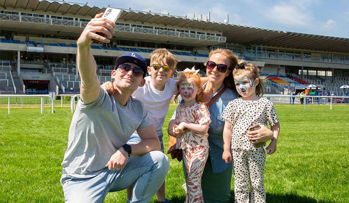 The Cafolla family pose for a selfie during the track walk ahead of the races. Pic: INPHO/Tom Maher