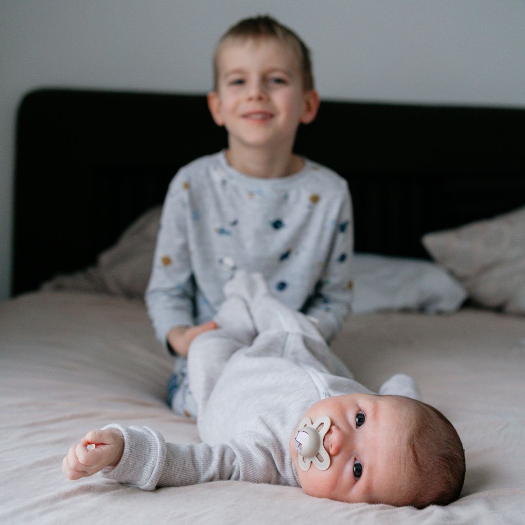 Brother and baby sibling