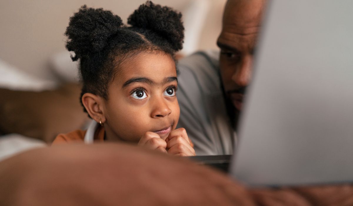 Girl watching something on laptop