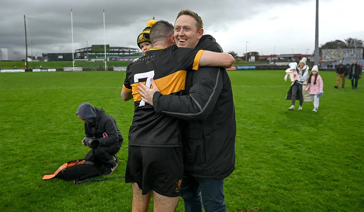 Brian Looney of Dr Crokes celebrates with former Dr Crokes player Colm Cooper, right, after the Kerry County Senior Club Football Championship final match between Dingle and Dr Crokes at Austin Stack Park in Tralee, Kerry. Pic: Brendan Moran/Sportsfile