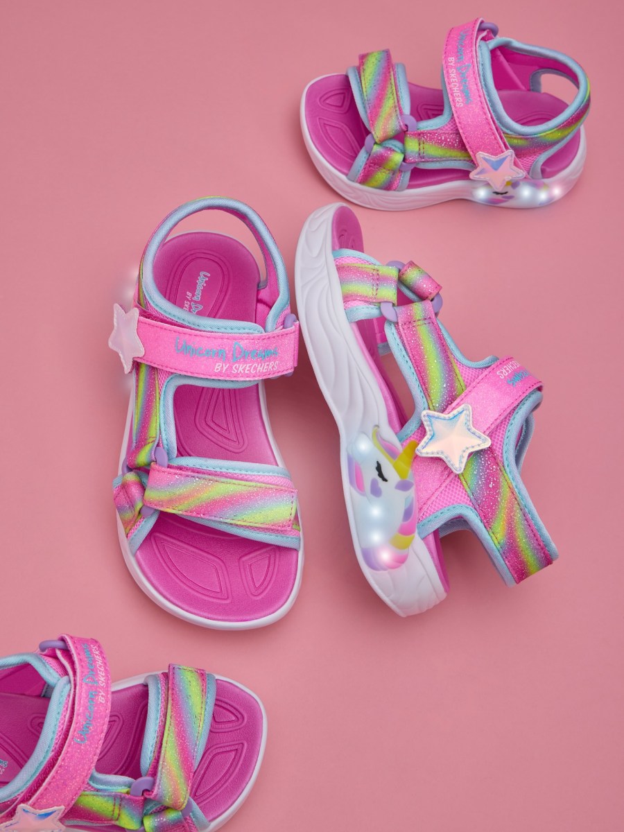 A pair of bright pink Skechers shoes