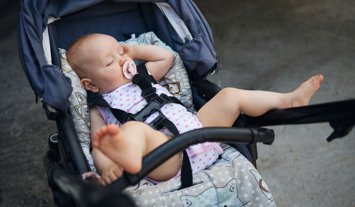 baby sleeping in pram