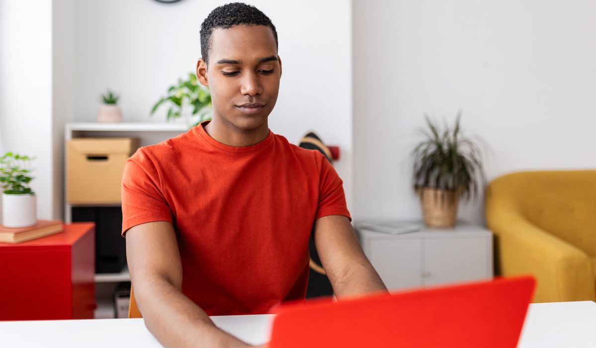 Teen using computer filling in CAO