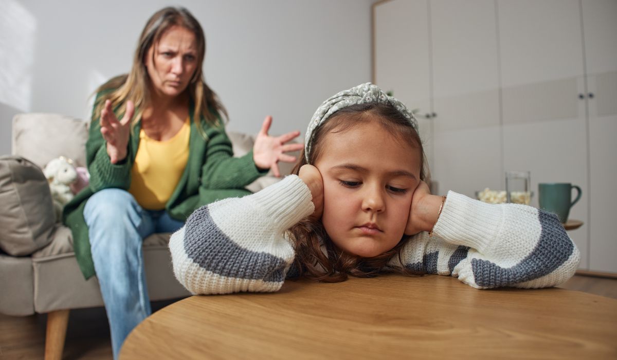 Mother scolding child