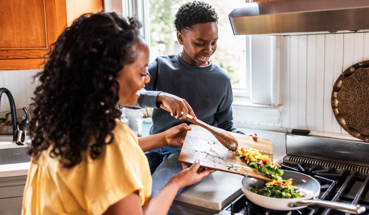 Mother cooking with son