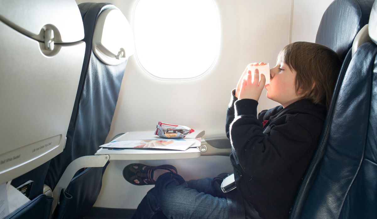 Child eating on flight