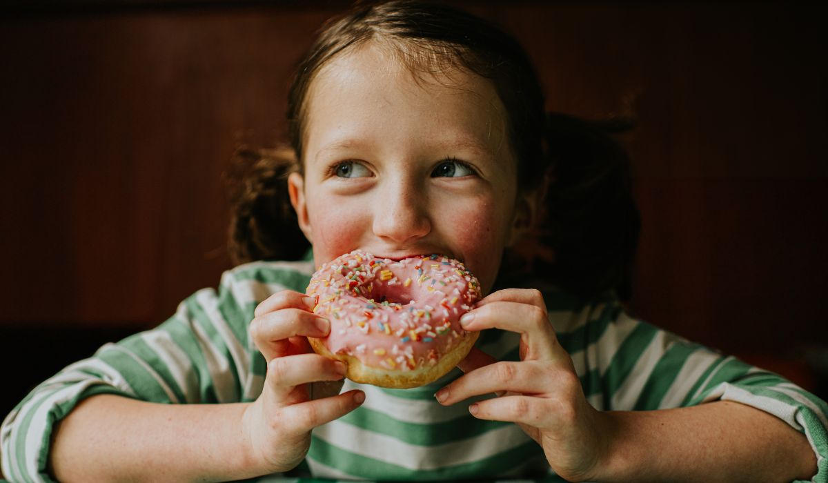 Girl eating doughnut