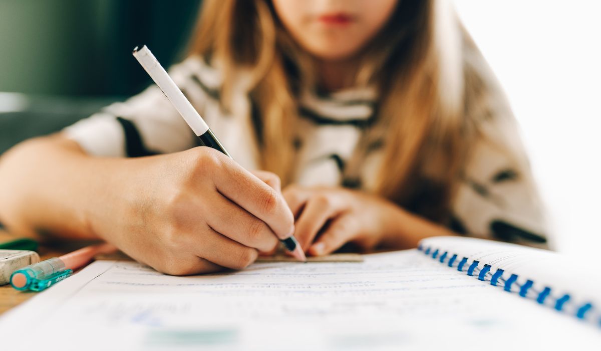 Girl writing in school