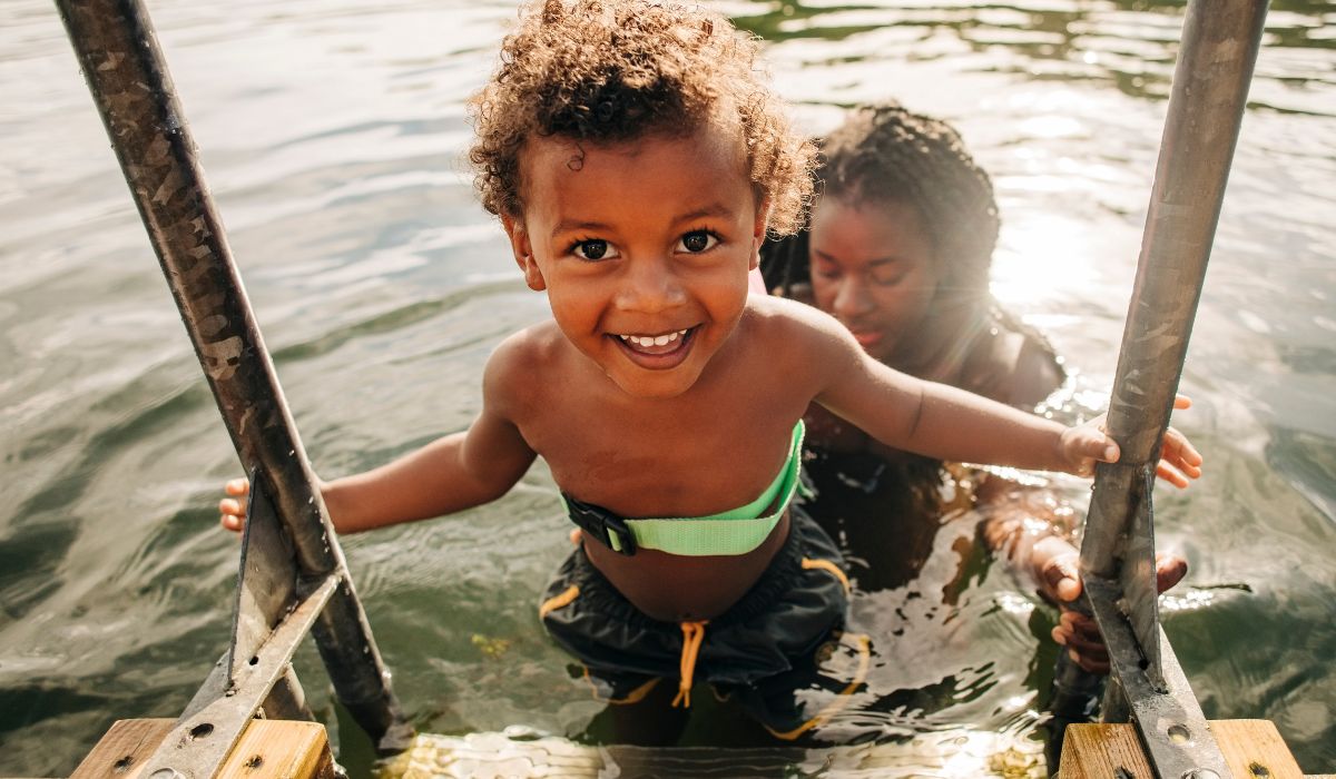 Parent and child swimming