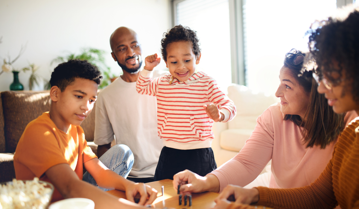 Family playing board game
